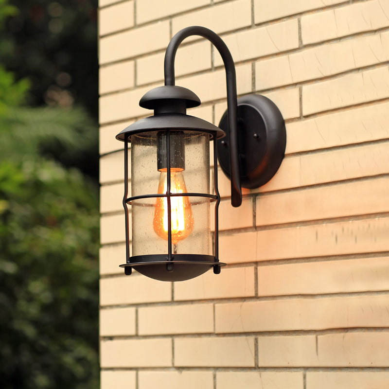 Seeded Glass Black Wall Sconce Lighting Cylinder 1-Light Traditional Light Fixture with Cage Clearhalo 'Wall Lamps & Sconces' 'Wall Lights' Lighting' 612685