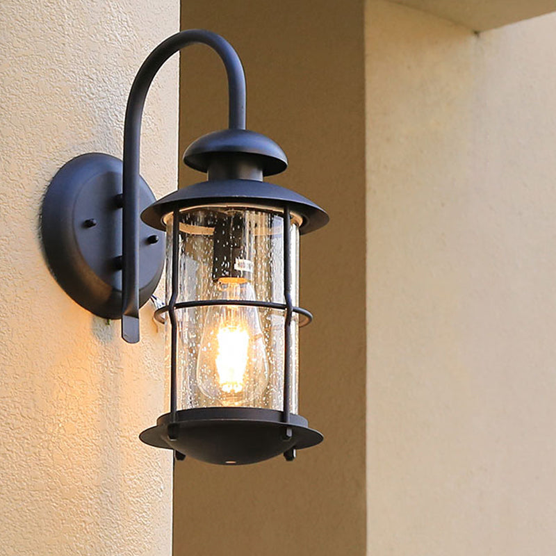 Seeded Glass Black Wall Sconce Lighting Cylinder 1-Light Traditional Light Fixture with Cage Clearhalo 'Wall Lamps & Sconces' 'Wall Lights' Lighting' 612686