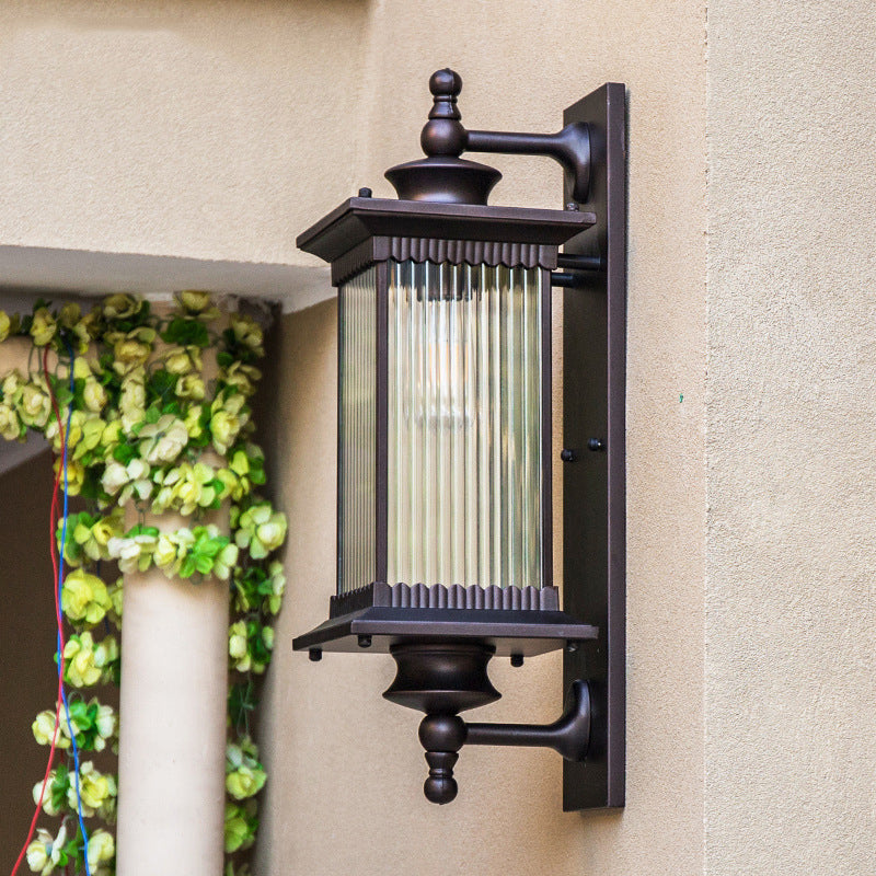 Cuboid Outdoor Sconce Light Country Clear Ribbed Glass 1-Head Black/Bronze/Coffee Wall Lamp for Gate Bronze Clearhalo 'Wall Lamps & Sconces' 'Wall Lights' Lighting' 615553