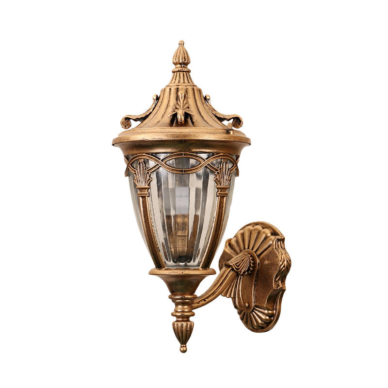 1 Bulb Urn Wall Sconce Light Loft Brass/Black Metal Wall Lamp Fixture with Clear Ribbed Glass Shade Clearhalo 'Wall Lamps & Sconces' 'Wall Lights' Lighting' 615808