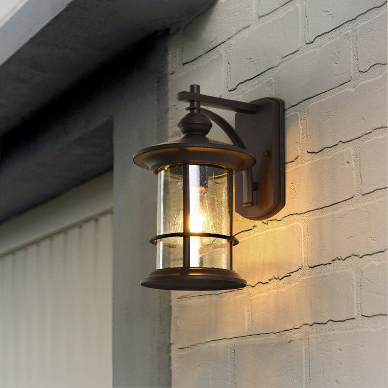 Clear Seeded Glass Cylinder Sconce Light Lodges 1-Bulb Outdoor Wall Mounted Lamp in Black/Coffee for Garden Clearhalo 'Wall Lamps & Sconces' 'Wall Lights' Lighting' 623797