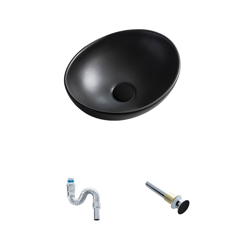 Contemporary Bathroom Sink Pop-Up Drain Porcelain Oval-Shape Vessel Lavatory Sink 16.1"L x 13"W x 5.7"H Black Sink Clearhalo 'Bathroom Remodel & Bathroom Fixtures' 'Bathroom Sinks & Faucet Components' 'Bathroom Sinks' 'bathroom_sink' 'Home Improvement' 'home_improvement' 'home_improvement_bathroom_sink' 6239271