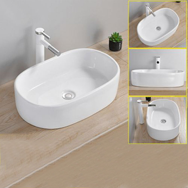 Modern Wash Stand Porcelain Rectangular with Drain Assembly and Pop-Up Drain Vessel Sink 21.7"L x 13.8"W x 5.5"H Clearhalo 'Bathroom Remodel & Bathroom Fixtures' 'Bathroom Sinks & Faucet Components' 'Bathroom Sinks' 'bathroom_sink' 'Home Improvement' 'home_improvement' 'home_improvement_bathroom_sink' 6255852