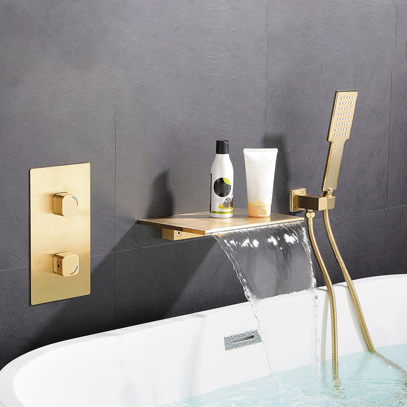 Modern Wall Mounted Metal Tub Filler Low Arc Waterfall Tub Faucet Trim Gold Clearhalo 'Bathroom Remodel & Bathroom Fixtures' 'Bathtub Faucets' 'bathtub_faucets' 'Home Improvement' 'home_improvement' 'home_improvement_bathtub_faucets' 6400275
