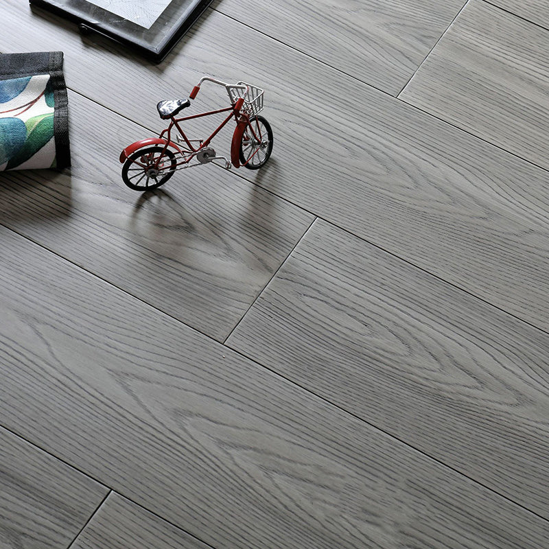 Modern Solid Wood Laminate Flooring Scratch Resistant Laminate Plank Flooring Black/Gray Clearhalo 'Flooring 'Home Improvement' 'home_improvement' 'home_improvement_laminate_flooring' 'Laminate Flooring' 'laminate_flooring' Walls and Ceiling' 6429080