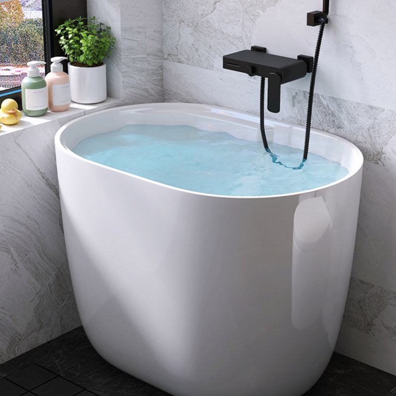 Modern Style Freestanding Bath Tub Oval Acrylic Soaking Bathtub in White 39"L x 23"W x 27"H Without Seat Tub with Wall Mounted Faucets Clearhalo 'Bathroom Remodel & Bathroom Fixtures' 'Bathtubs' 'Home Improvement' 'home_improvement' 'home_improvement_bathtubs' 'Showers & Bathtubs' 6639858