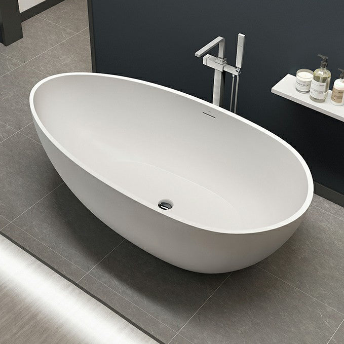 Modern Stone Freestanding Bathtub White Soaking Bathtub for Bathroom 67"L x 34"W x 21"H Oval Clearhalo 'Bathroom Remodel & Bathroom Fixtures' 'Bathtubs' 'Home Improvement' 'home_improvement' 'home_improvement_bathtubs' 'Showers & Bathtubs' 6782254