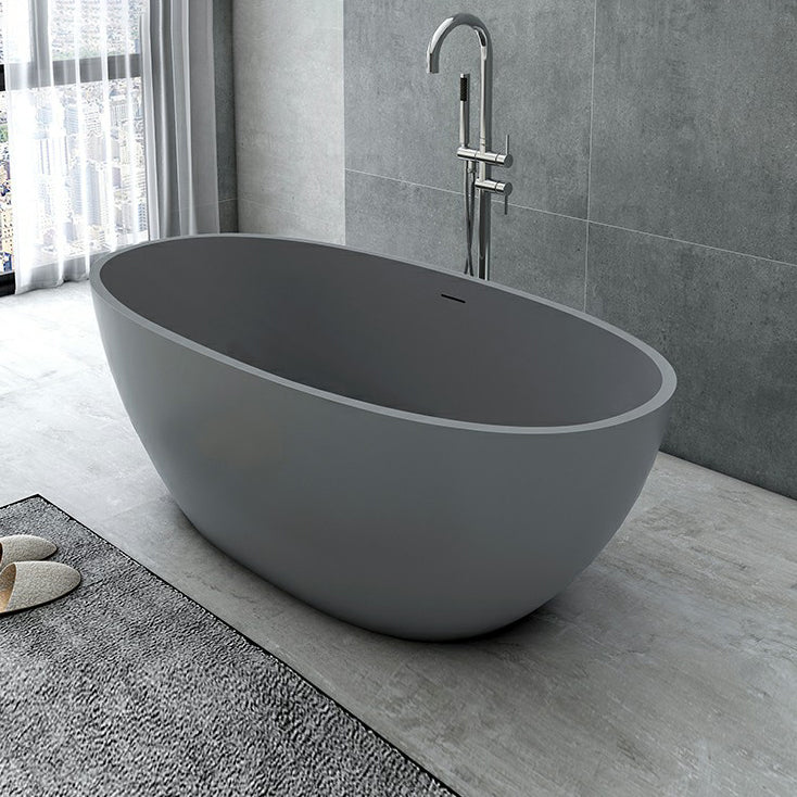 Modern Soaking Freestanding Bath Tub Stone Oval Bathtub with Overflow Trim Grey 59"L x 31"W x 22"H 1\ (2.5cm) Clearhalo 'Bathroom Remodel & Bathroom Fixtures' 'Bathtubs' 'Home Improvement' 'home_improvement' 'home_improvement_bathtubs' 'Showers & Bathtubs' 6795876