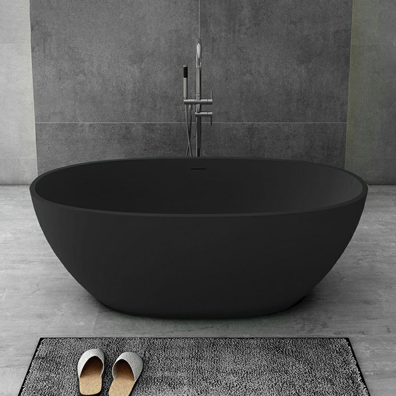 Modern Soaking Freestanding Bath Tub Stone Oval Bathtub with Overflow Trim Black 1\ (2.5cm) Clearhalo 'Bathroom Remodel & Bathroom Fixtures' 'Bathtubs' 'Home Improvement' 'home_improvement' 'home_improvement_bathtubs' 'Showers & Bathtubs' 6795877