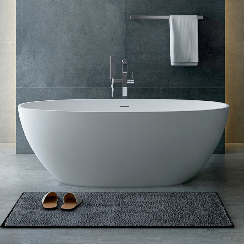 Modern Soaking Freestanding Bath Tub Stone Oval Bathtub with Overflow Trim White 1\ (2.5cm) Clearhalo 'Bathroom Remodel & Bathroom Fixtures' 'Bathtubs' 'Home Improvement' 'home_improvement' 'home_improvement_bathtubs' 'Showers & Bathtubs' 6795880