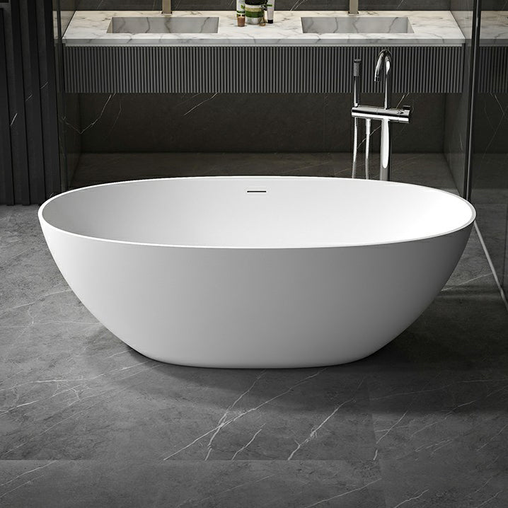 Modern Soaking Freestanding Bath Tub Stone Oval Bathtub with Overflow Trim White 0.5\ (1.2cm) Clearhalo 'Bathroom Remodel & Bathroom Fixtures' 'Bathtubs' 'Home Improvement' 'home_improvement' 'home_improvement_bathtubs' 'Showers & Bathtubs' 6795892