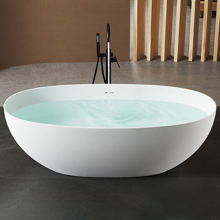 Modern Style Freestanding Soaking Bathtub Stone Bathroom Bathtub in White 51"L x 27"W x 22"H Oval Clearhalo 'Bathroom Remodel & Bathroom Fixtures' 'Bathtubs' 'Home Improvement' 'home_improvement' 'home_improvement_bathtubs' 'Showers & Bathtubs' 6811912