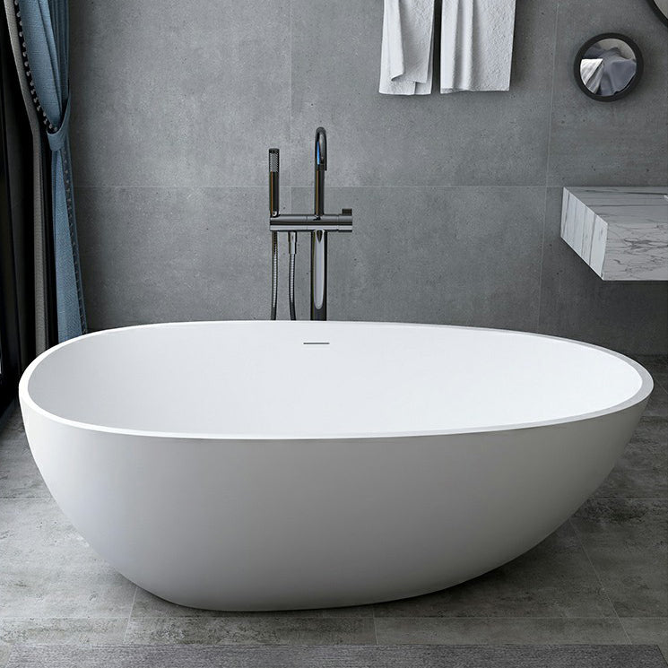 Modern Style Oval Freestanding Bathtub Stone Bathtub with Overflow Trim White 1\ (2.5cm) Clearhalo 'Bathroom Remodel & Bathroom Fixtures' 'Bathtubs' 'Home Improvement' 'home_improvement' 'home_improvement_bathtubs' 'Showers & Bathtubs' 6812031