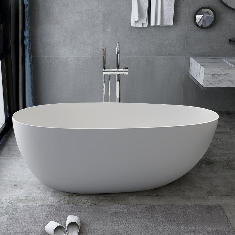 Modern Style Oval Freestanding Bathtub Stone Bathtub with Overflow Trim White 0.5\ (1.2cm) Clearhalo 'Bathroom Remodel & Bathroom Fixtures' 'Bathtubs' 'Home Improvement' 'home_improvement' 'home_improvement_bathtubs' 'Showers & Bathtubs' 6812037