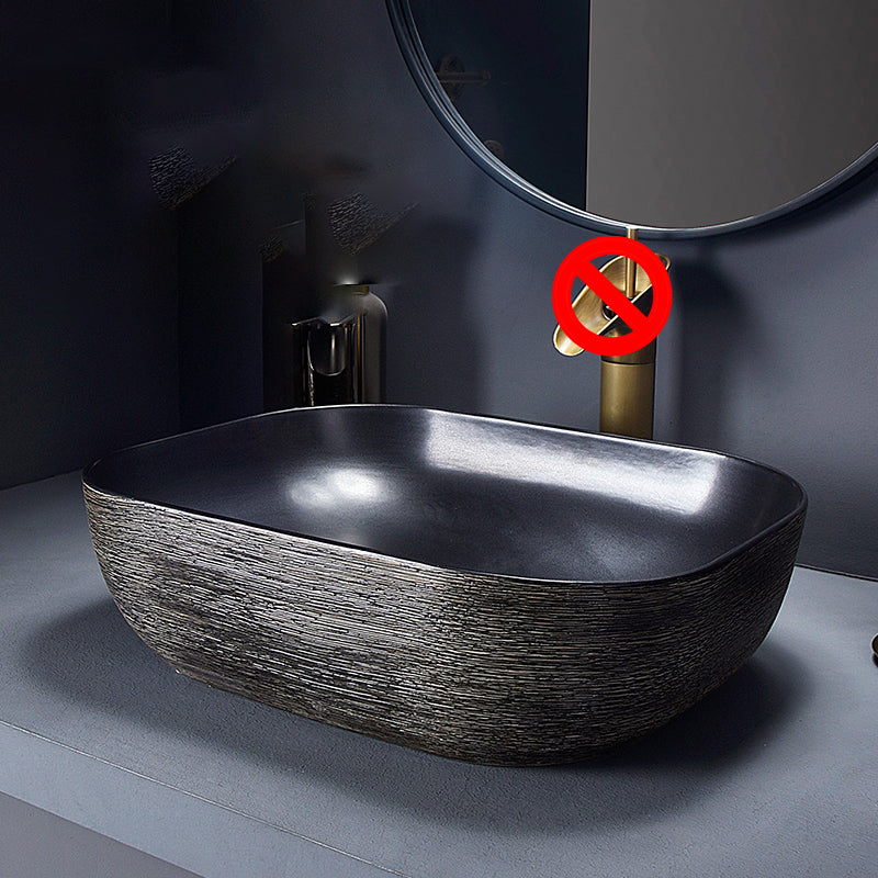 Modern Bathroom Sink Black Oval Ceramic Bathroom Sink with Faucet 20"L x 15"W x 6"H Sink Clearhalo 'Bathroom Remodel & Bathroom Fixtures' 'Bathroom Sinks & Faucet Components' 'Bathroom Sinks' 'bathroom_sink' 'Home Improvement' 'home_improvement' 'home_improvement_bathroom_sink' 6926934