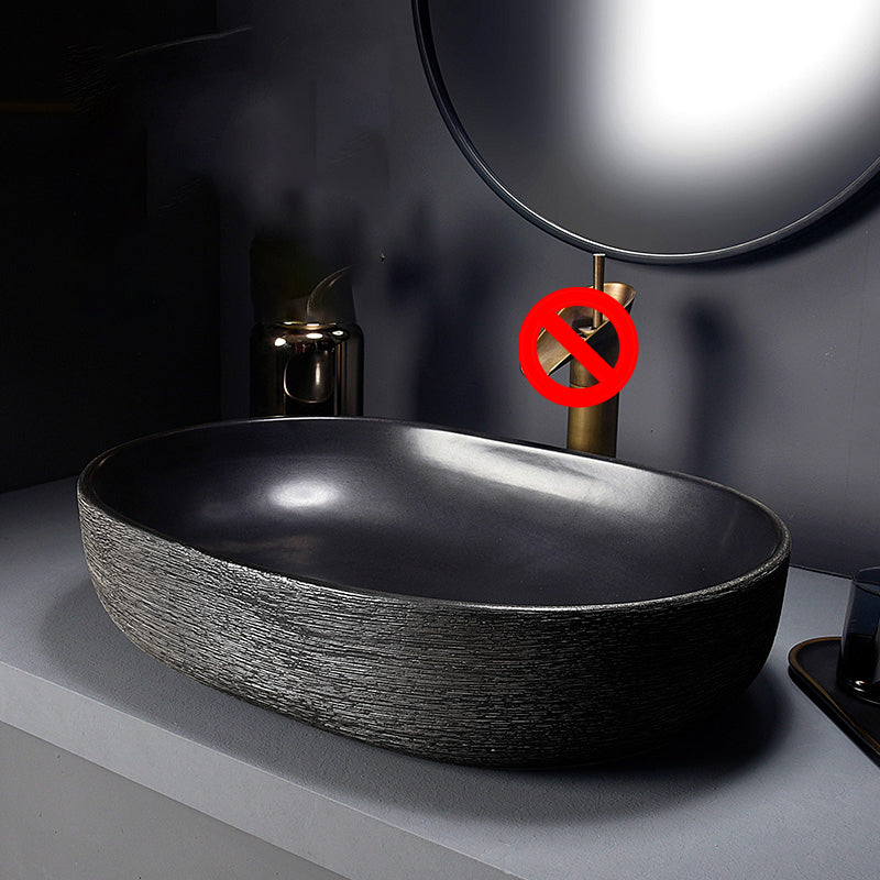 Modern Bathroom Sink Black Oval Ceramic Bathroom Sink with Faucet 23"L x 16"W x 6"H Sink Clearhalo 'Bathroom Remodel & Bathroom Fixtures' 'Bathroom Sinks & Faucet Components' 'Bathroom Sinks' 'bathroom_sink' 'Home Improvement' 'home_improvement' 'home_improvement_bathroom_sink' 6926936