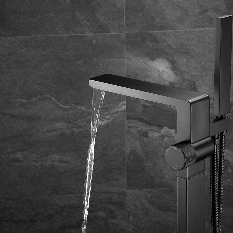 Freestanding Tub Filler Black Brass Single Knob Handle Fixed Tub Filler with Handshower Clearhalo 'Bathroom Remodel & Bathroom Fixtures' 'Bathtub Faucets' 'bathtub_faucets' 'Home Improvement' 'home_improvement' 'home_improvement_bathtub_faucets' 6952743