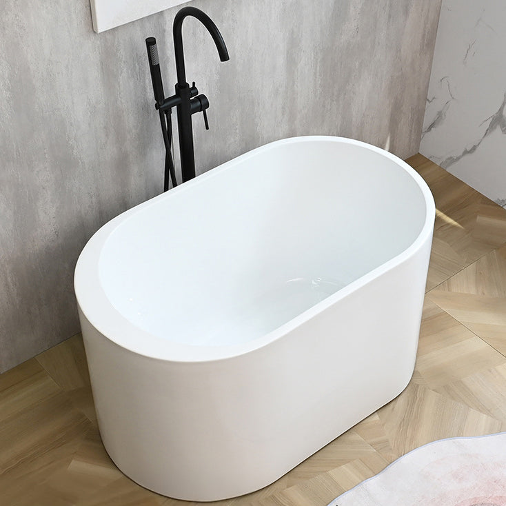 Freestanding White Bathtub Oval Modern Back to Wall Bath With Faucet Tub with Freestanding Tub Fillers Clearhalo 'Bathroom Remodel & Bathroom Fixtures' 'Bathtubs' 'Home Improvement' 'home_improvement' 'home_improvement_bathtubs' 'Showers & Bathtubs' 6963459