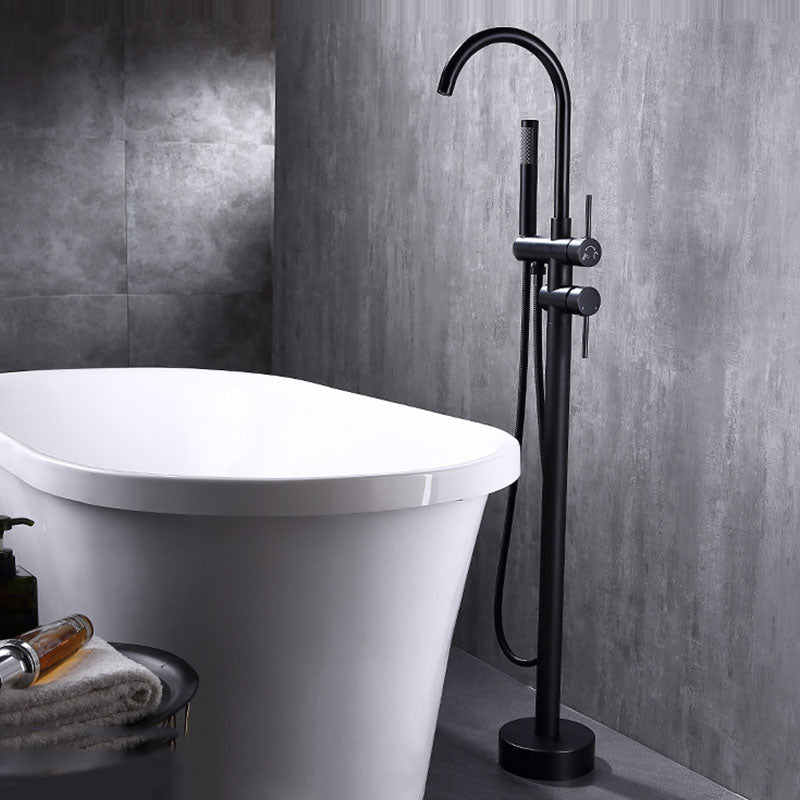 Floor Mounted Copper Freestanding Tub Filler Freestanding High Arc Tub Metal Filler Trim Black Ground Clearhalo 'Bathroom Remodel & Bathroom Fixtures' 'Bathtub Faucets' 'bathtub_faucets' 'Home Improvement' 'home_improvement' 'home_improvement_bathtub_faucets' 7011573