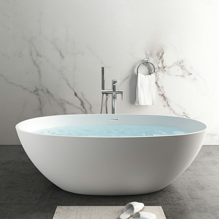 Modern Stone Oval White Bathtub Freestanding Soaking Bath for Bathroom White 63"L x 30"W x 22"H Overflow Hole Included Clearhalo 'Bathroom Remodel & Bathroom Fixtures' 'Bathtubs' 'Home Improvement' 'home_improvement' 'home_improvement_bathtubs' 'Showers & Bathtubs' 7023573