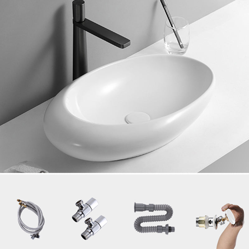 Contemporary Bathroom Sink with Pop-Up Drain Porcelain Oval-Shape Vessel Lavatory Sink 22.8"L x 14.6"W x 5.1"H 7 Shape Sink with Faucet Clearhalo 'Bathroom Remodel & Bathroom Fixtures' 'Bathroom Sinks & Faucet Components' 'Bathroom Sinks' 'bathroom_sink' 'Home Improvement' 'home_improvement' 'home_improvement_bathroom_sink' 7208987