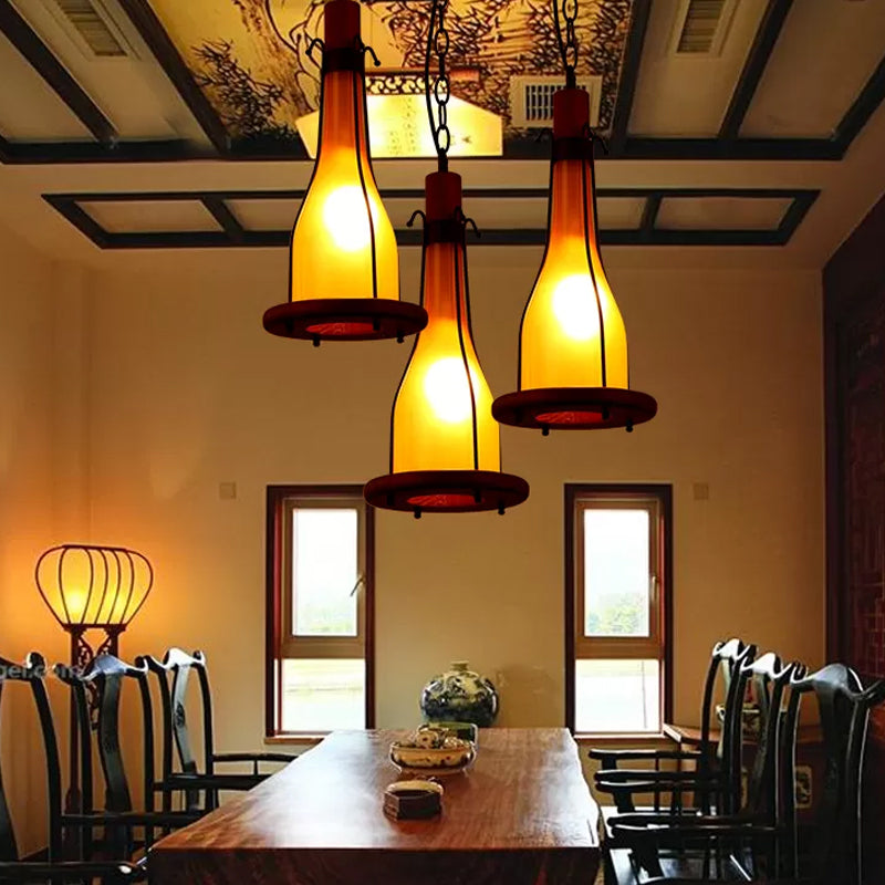 Brown 1 Head Ceiling Pendant Warehouse Yellow Glass Bottle Hanging Light Kit with Wood Tray Design Clearhalo 'Ceiling Lights' 'Glass shade' 'Glass' 'Industrial Pendants' 'Industrial' 'Middle Century Pendants' 'Pendant Lights' 'Pendants' 'Tiffany' Lighting' 728398