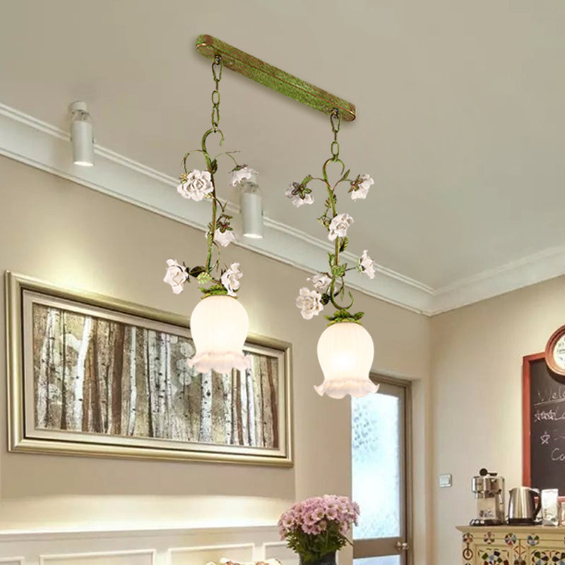 Green 2 Bulbs Multi Light Pendant Pastoral Style White Glass Flower Hanging Lamp for Dining Room Clearhalo 'Ceiling Lights' 'Chandeliers' 'Glass shade' 'Glass' 'Pendant Lights' 'Pendants' Lighting' 729688