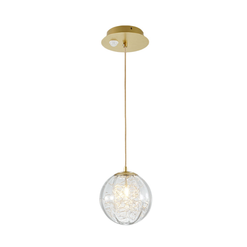 Brass Pumpkin Ball Ceiling Light Modern 1-Bulb Clear Glass Suspended Pendant Lamp for Bedside Clearhalo 'Ceiling Lights' 'Glass shade' 'Glass' 'Modern Pendants' 'Modern' 'Pendant Lights' 'Pendants' Lighting' 730338