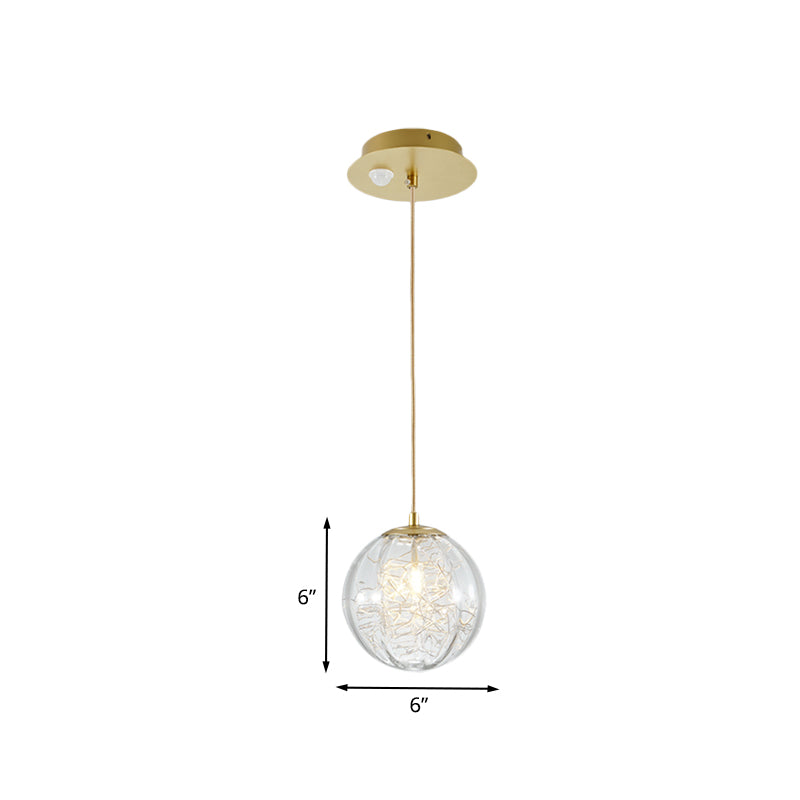 Brass Pumpkin Ball Ceiling Light Modern 1-Bulb Clear Glass Suspended Pendant Lamp for Bedside Clearhalo 'Ceiling Lights' 'Glass shade' 'Glass' 'Modern Pendants' 'Modern' 'Pendant Lights' 'Pendants' Lighting' 730339