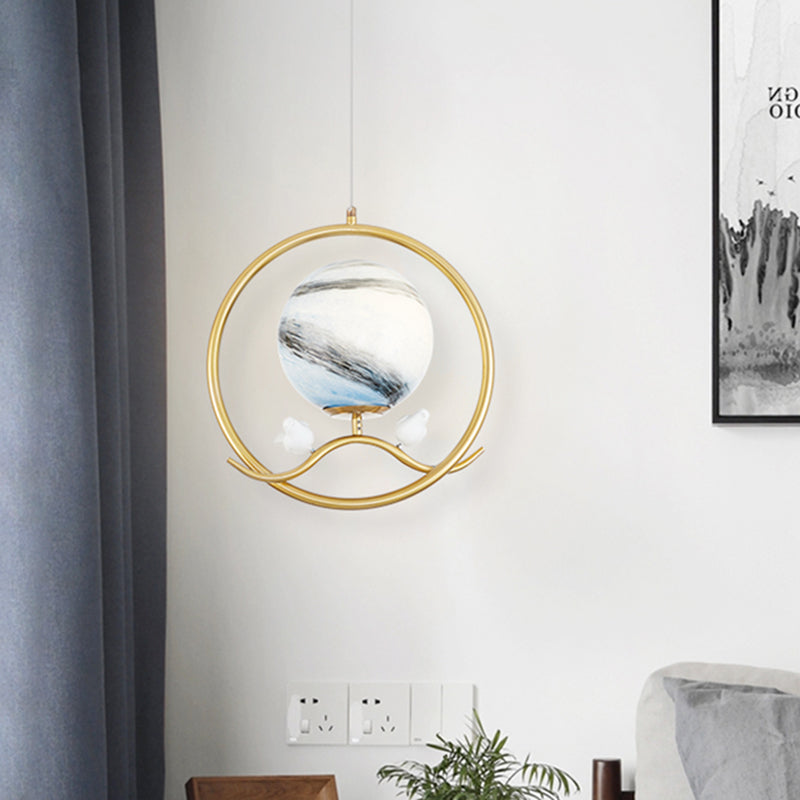 Post Modern Ring Pendant Metallic 1 Light Living Room Hanging Lamp in Gold with Planet Glass Shade and Bird Deco Gold Clearhalo 'Ceiling Lights' 'Close To Ceiling Lights' 'Glass shade' 'Glass' 'Modern Pendants' 'Modern' 'Pendant Lights' 'Pendants' Lighting' 730489