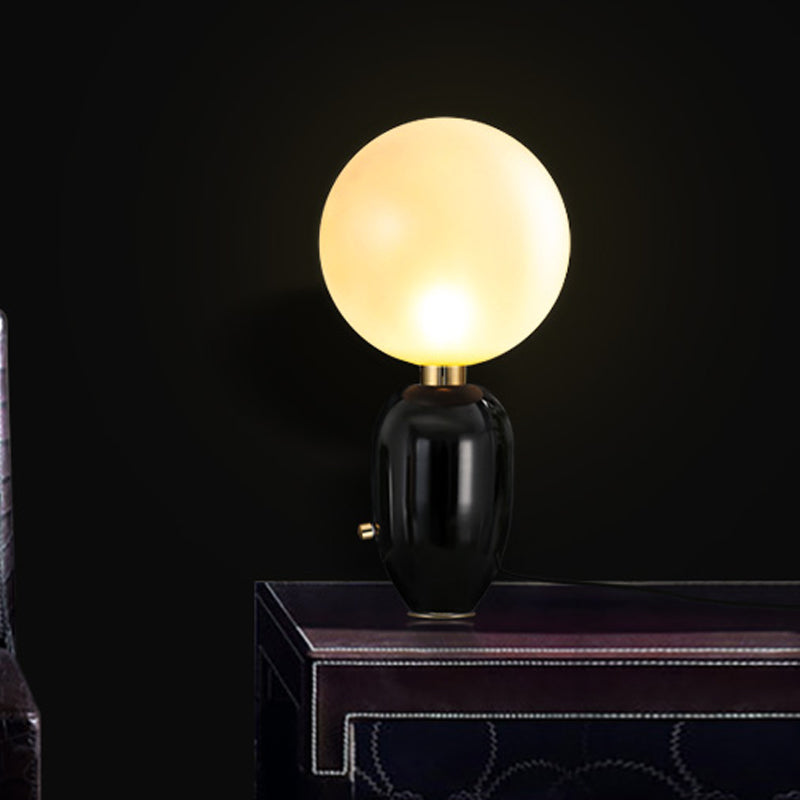 Capsule Table Lighting Modern Metallic 1 Light Living Room LED Desk Lamp in Black/Gold with Orb White Glass Shade Clearhalo 'Lamps' 'Table Lamps' Lighting' 730715