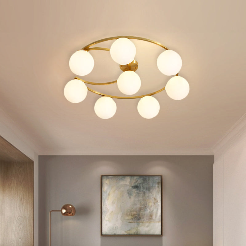 Gold Ball Semi Flushmount Modernist 3/6/8-Light Cream Glass LED Flush Mounted Lamp with Moon Design Clearhalo 'Ceiling Lights' 'Close To Ceiling Lights' 'Close to ceiling' 'Glass shade' 'Glass' 'Semi-flushmount' Lighting' 731135