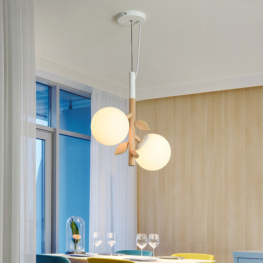 Modernist Ball Chandelier White Frosted Glass 2/3 Heads Dining Room Wood Ceiling Lamp with Vertical Branch Rod 2 White Clearhalo 'Ceiling Lights' 'Chandeliers' 'Glass shade' 'Glass' 'Modern Chandeliers' 'Modern' Lighting' 731204