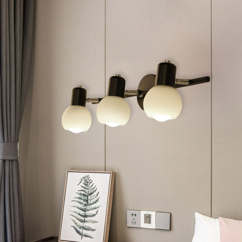 Modo Sconce Lighting Minimalist Opal Glass 2/3-Bulb Study Room Wall Mount Lamp in Black with Linear Design Clearhalo 'Cast Iron' 'Glass' 'Industrial' 'Modern wall lights' 'Modern' 'Tiffany' 'Traditional wall lights' 'Wall Lamps & Sconces' 'Wall Lights' Lighting' 731376