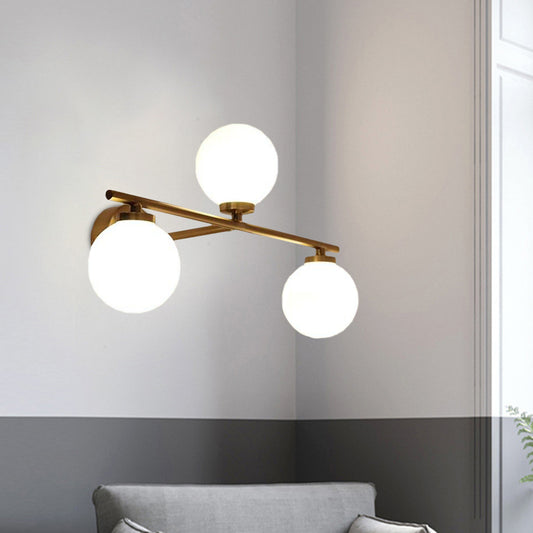Globe Opal Glass Sconce Light Fixture Minimalist 3 Bulbs Gold Up and Down Linear Wall Lamp Clearhalo 'Cast Iron' 'Glass' 'Industrial' 'Modern wall lights' 'Modern' 'Tiffany' 'Traditional wall lights' 'Wall Lamps & Sconces' 'Wall Lights' Lighting' 731389