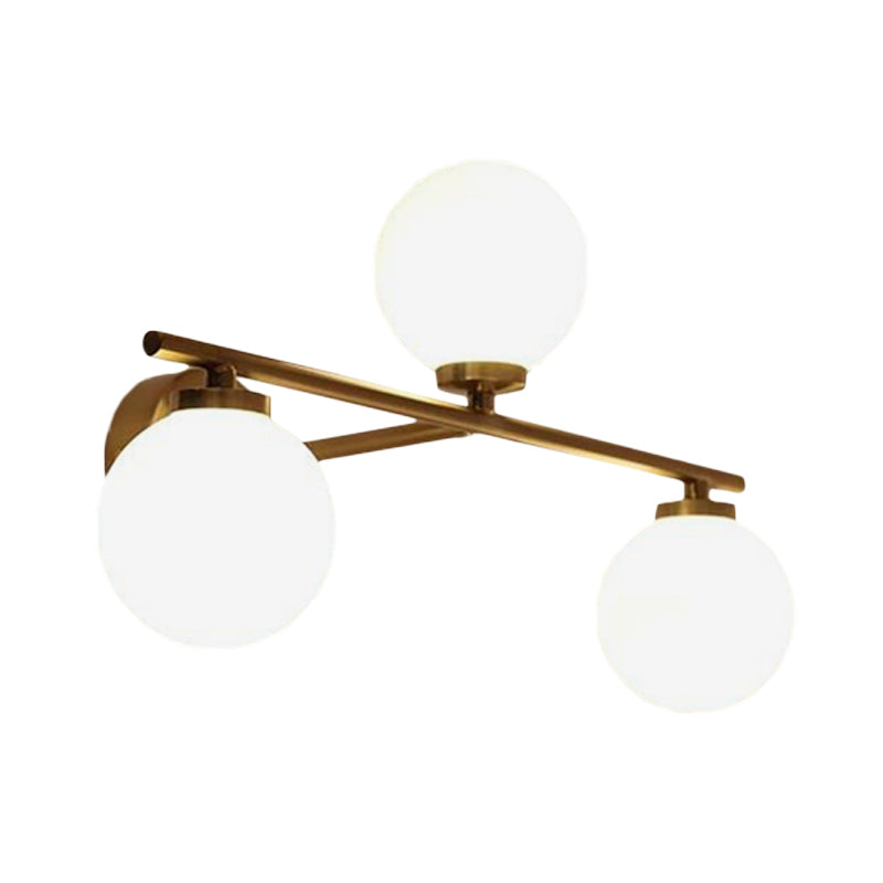 Globe Opal Glass Sconce Light Fixture Minimalist 3 Bulbs Gold Up and Down Linear Wall Lamp Clearhalo 'Cast Iron' 'Glass' 'Industrial' 'Modern wall lights' 'Modern' 'Tiffany' 'Traditional wall lights' 'Wall Lamps & Sconces' 'Wall Lights' Lighting' 731390