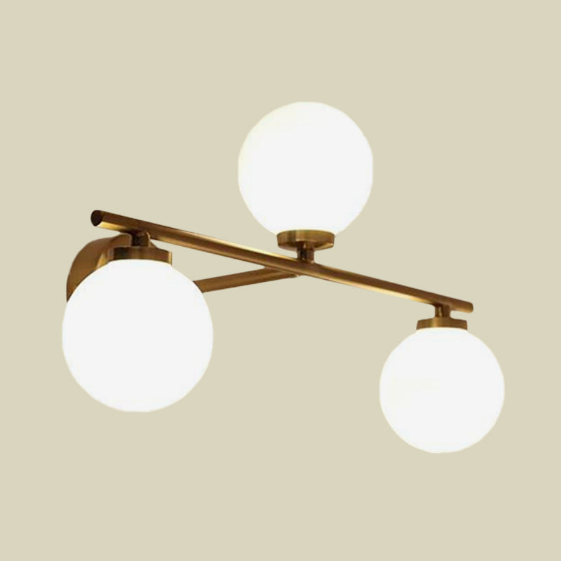 Globe Opal Glass Sconce Light Fixture Minimalist 3 Bulbs Gold Up and Down Linear Wall Lamp Clearhalo 'Cast Iron' 'Glass' 'Industrial' 'Modern wall lights' 'Modern' 'Tiffany' 'Traditional wall lights' 'Wall Lamps & Sconces' 'Wall Lights' Lighting' 731391