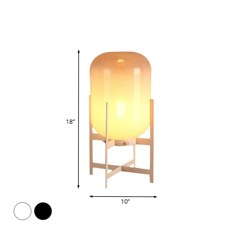 Minimalist Quadruped Night Light Metal 1-Head Living Room Table Lamp in White/Black with Oval Tan Glass Shade Clearhalo 'Lamps' 'Table Lamps' Lighting' 731456