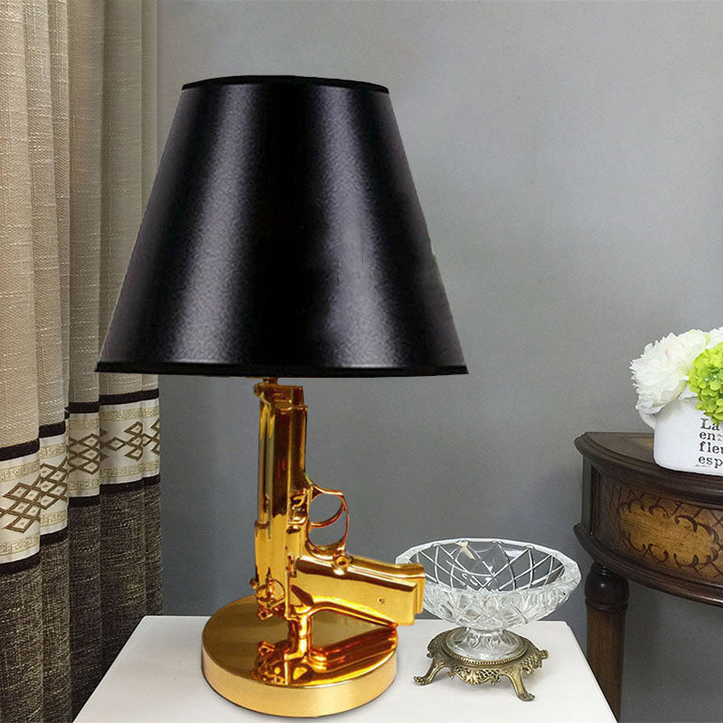 Black Finish Barrel Shade Table Light Modernist 1-Head Fabric Desk Lamp with Gold Gun-Shape Body Black Clearhalo 'Lamps' 'Table Lamps' Lighting' 733833