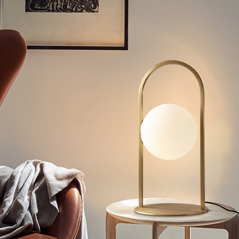Post Modern Oval Ring Table Light Metal 1 Bulb Living Room Desk Lamp in Brass with Ball Milk Glass Shade Clearhalo 'Lamps' 'Table Lamps' Lighting' 733880