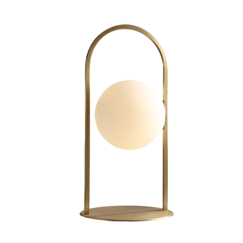 Post Modern Oval Ring Table Light Metal 1 Bulb Living Room Desk Lamp in Brass with Ball Milk Glass Shade Clearhalo 'Lamps' 'Table Lamps' Lighting' 733881