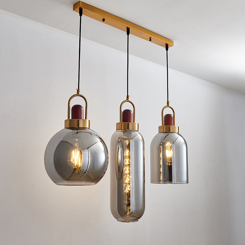 Smoke Grey Glass Geometric Cluster Pendant Light Minimalist 3-Head Brown Hanging Lamp Kit for Dining Room Smoke Gray Clearhalo 'Ceiling Lights' 'Glass shade' 'Glass' 'Modern Pendants' 'Modern' 'Pendant Lights' 'Pendants' Lighting' 734579