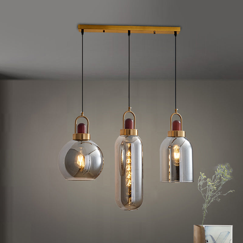 Smoke Grey Glass Geometric Cluster Pendant Light Minimalist 3-Head Brown Hanging Lamp Kit for Dining Room Clearhalo 'Ceiling Lights' 'Glass shade' 'Glass' 'Modern Pendants' 'Modern' 'Pendant Lights' 'Pendants' Lighting' 734580