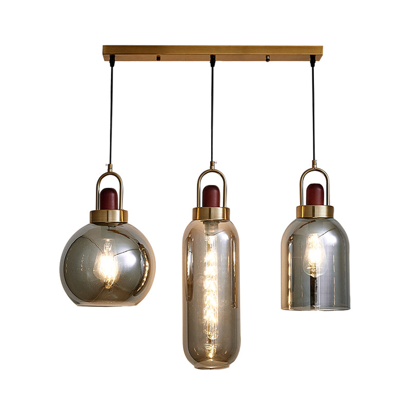 Smoke Grey Glass Geometric Cluster Pendant Light Minimalist 3-Head Brown Hanging Lamp Kit for Dining Room Clearhalo 'Ceiling Lights' 'Glass shade' 'Glass' 'Modern Pendants' 'Modern' 'Pendant Lights' 'Pendants' Lighting' 734582