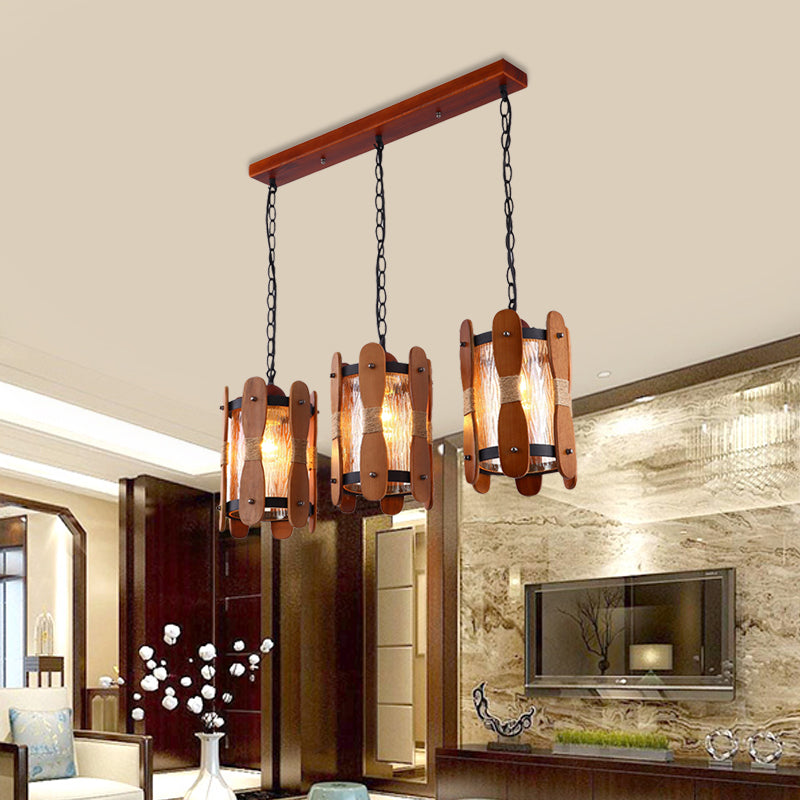 Cylinder Yellow Water Glass Cluster Pendant Retro 3 Heads Dining Room Hanging Light Kit in Brown with Wood Panel Design Brown Clearhalo 'Ceiling Lights' 'Glass shade' 'Glass' 'Industrial Pendants' 'Industrial' 'Middle Century Pendants' 'Pendant Lights' 'Pendants' 'Tiffany' Lighting' 735124