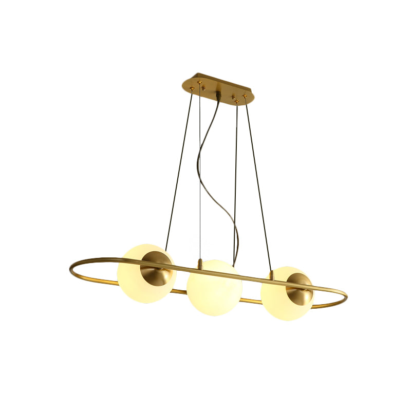 Sphere Dining Room Chandelier Frosted Glass 3-Light Post Modern Hanging Ceiling Lamp with Brass Oval Ring Beam Clearhalo 'Ceiling Lights' 'Chandeliers' 'Modern Chandeliers' 'Modern' Lighting' 735339