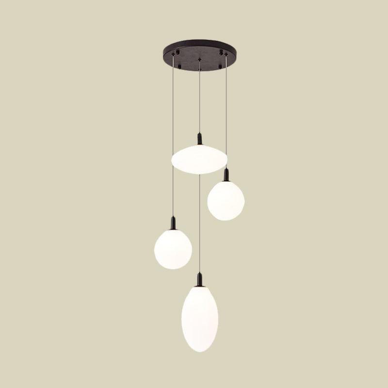 Gold/Black Ball and Oval Cluster Pendant Minimalism 4 Lights Cream Glass Hanging Lamp with Round Canopy Clearhalo 'Ceiling Lights' 'Close To Ceiling Lights' 'Glass shade' 'Glass' 'Modern Pendants' 'Modern' 'Pendant Lights' 'Pendants' Lighting' 735543