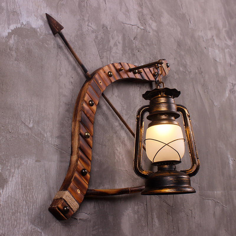 Vintage Lantern Wall Lamp 1 Light Opal Glass Sconce Light Fixture in Bronze with Wood Bow and Arrow Deco Clearhalo 'Art deco wall lights' 'Cast Iron' 'Glass' 'Industrial wall lights' 'Industrial' 'Middle century wall lights' 'Modern' 'Rustic wall lights' 'Tiffany' 'Traditional wall lights' 'Wall Lamps & Sconces' 'Wall Lights' Lighting' 736352