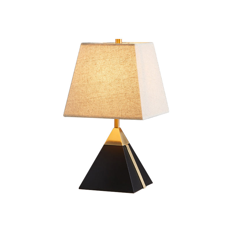 Modern Trapezoid Night Table Light Fabric 1 Light Bedroom Night Lamp in White/Flaxen with Black Pyramid Base Clearhalo 'Lamps' 'Table Lamps' Lighting' 736519