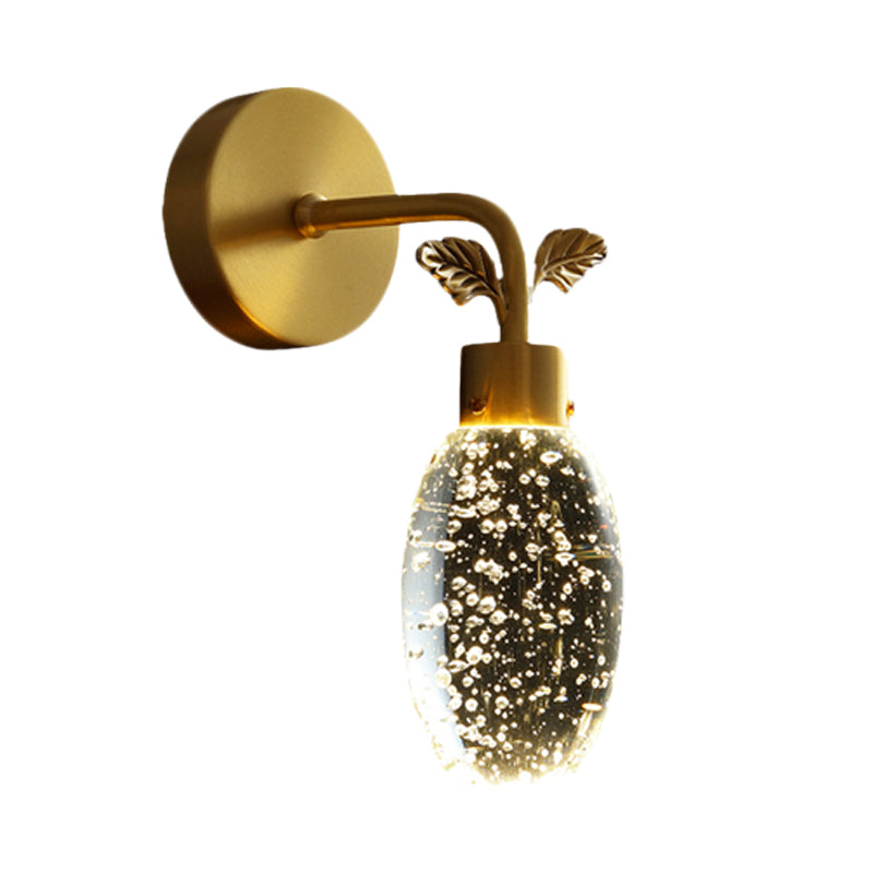 LED Wall Sconce Lighting Fixture Modern Oval Clear Seeded Crystal Bedroom Wall Light in Gold with Leaf Design Clearhalo 'Cast Iron' 'Glass' 'Industrial' 'Modern wall lights' 'Modern' 'Tiffany' 'Traditional wall lights' 'Wall Lamps & Sconces' 'Wall Lights' Lighting' 736892